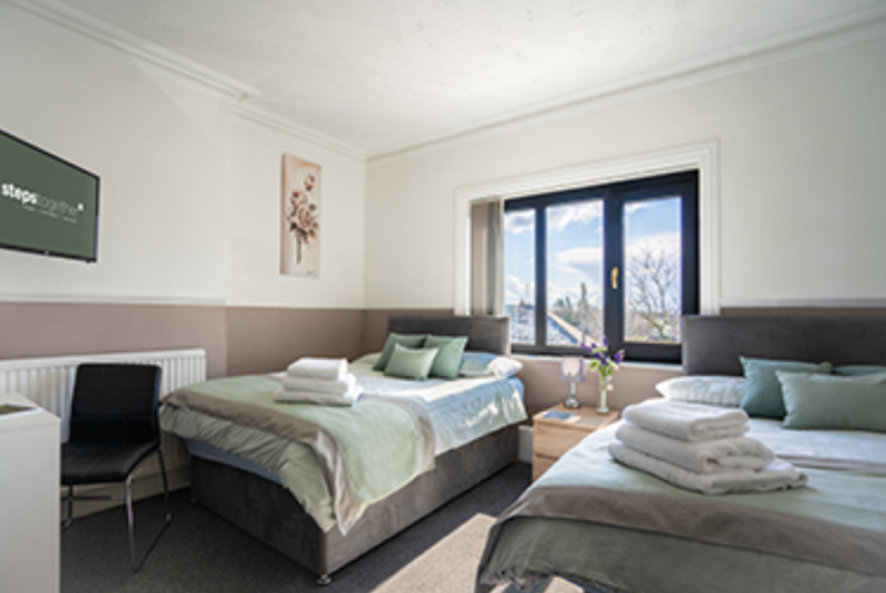 Steps Together Bank House